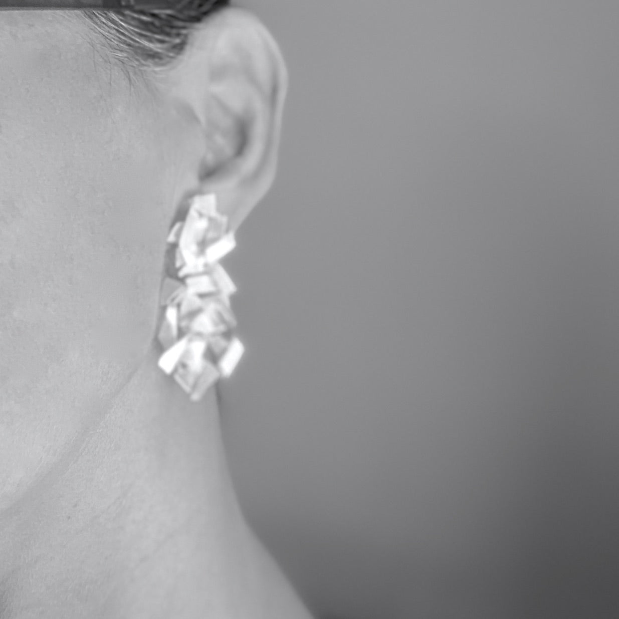 Shard cluster earrings capturing the misty summer air.