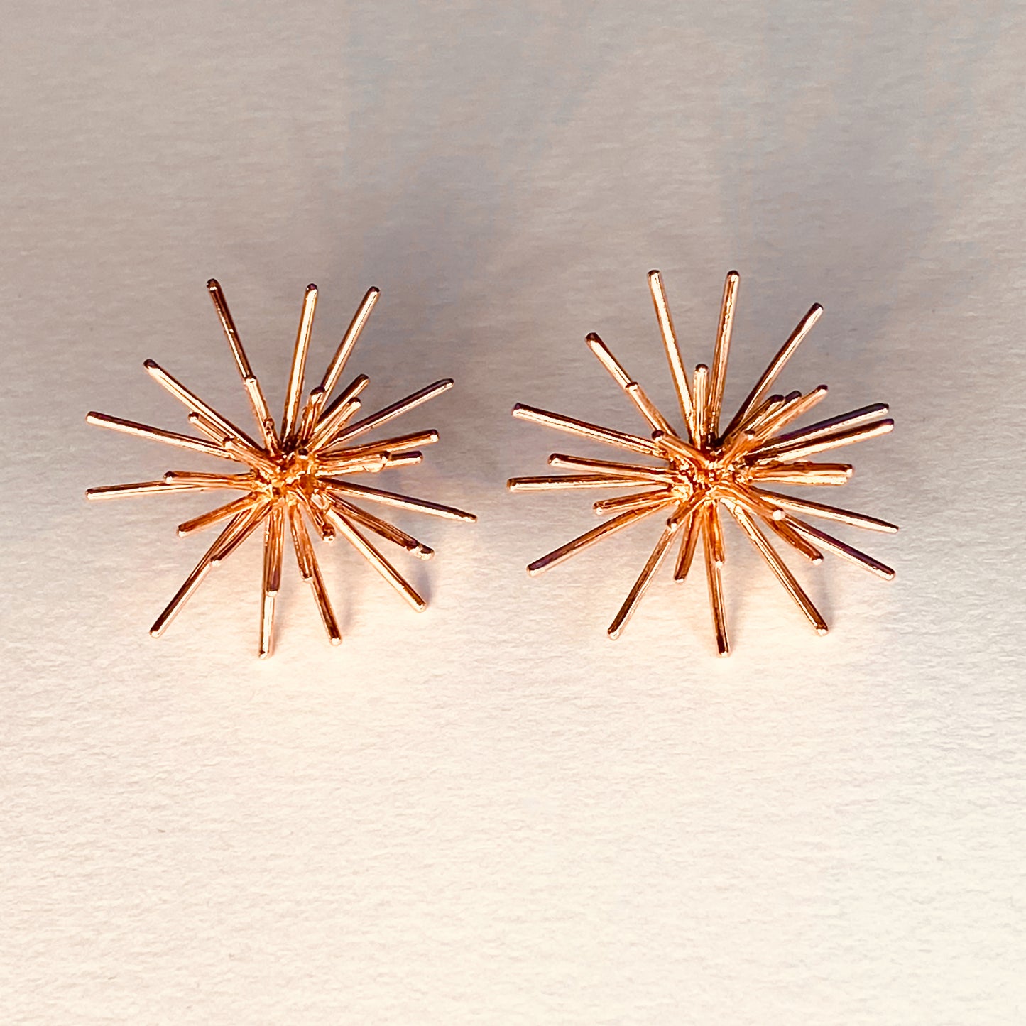 MIW designed these earrings inspired by her underwater explorations. Solid rose gold.