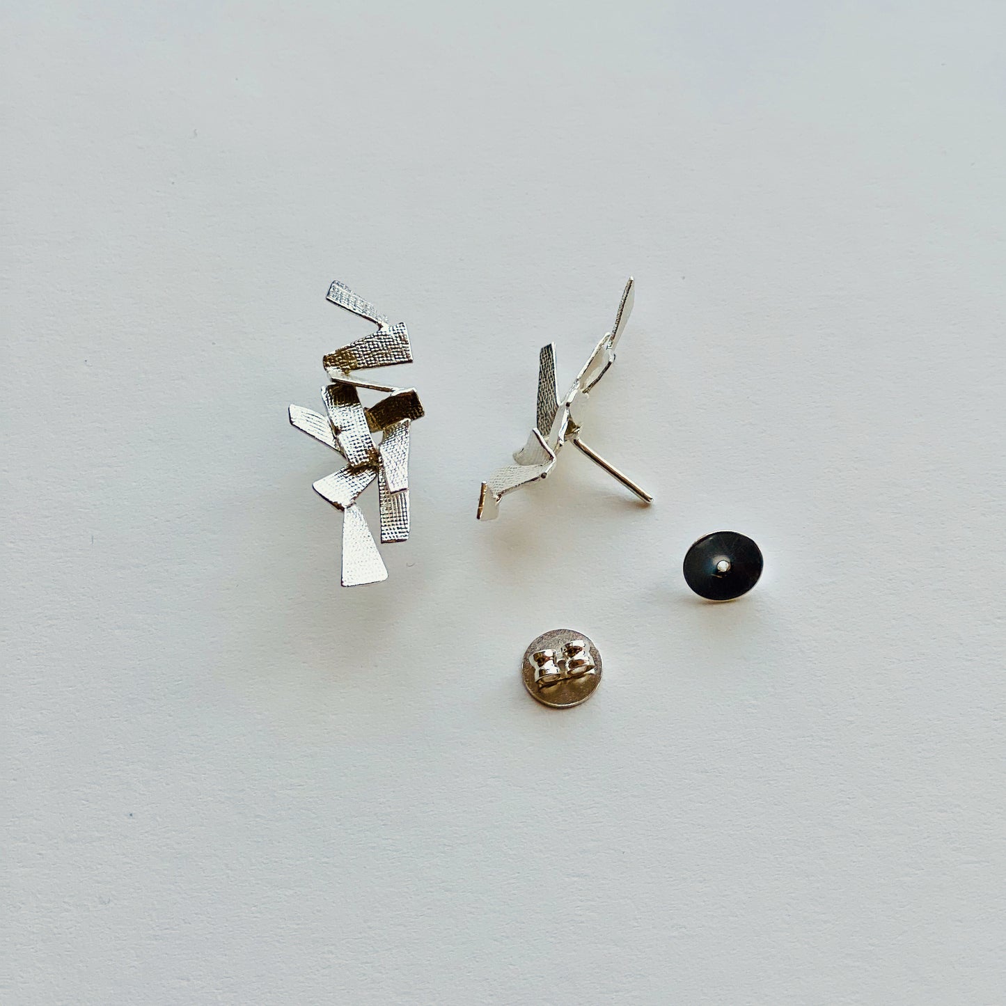 Shards, stud earrings with backs.