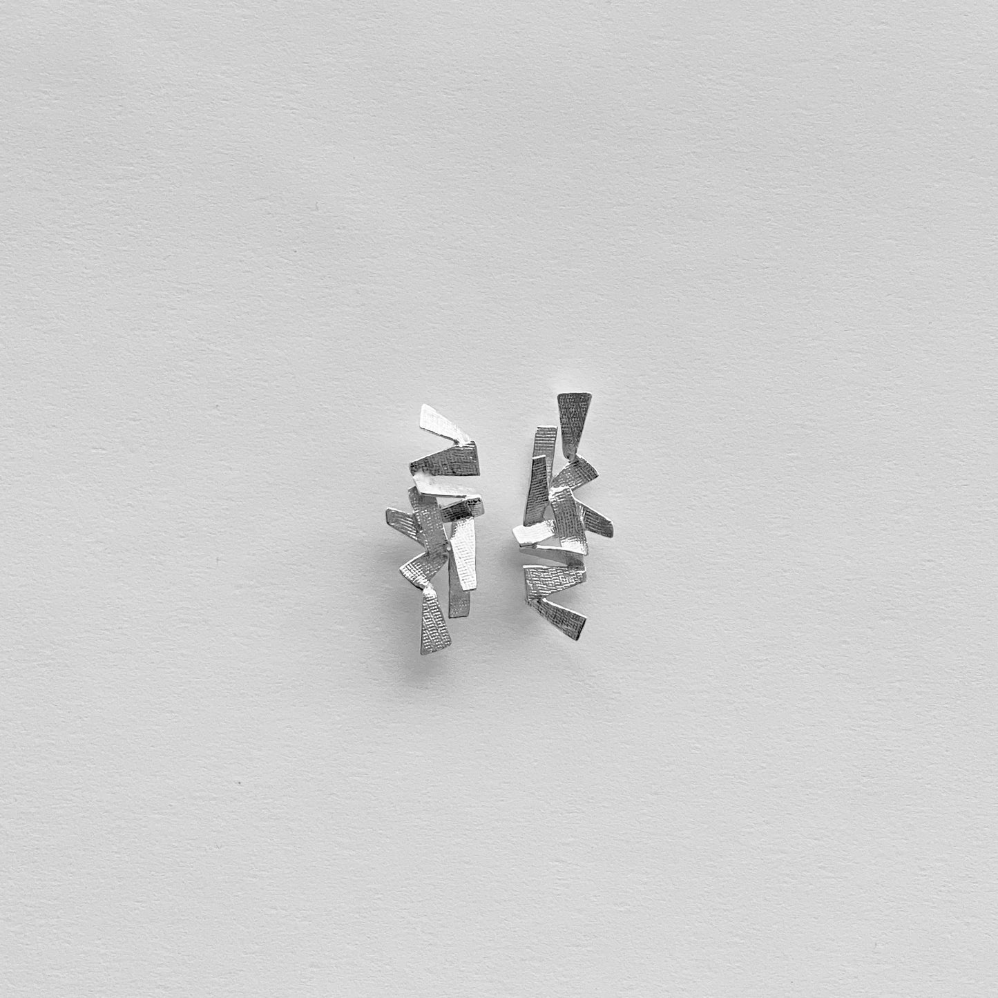 Shards, stud earring. Playful shapes in solid recycled sterling silver.